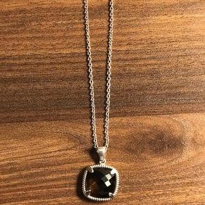 Silver necklace with brown pendant